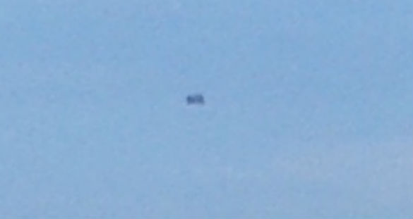 Witness in Ontario Photographs 'Rectangular Box-shaped UFO'