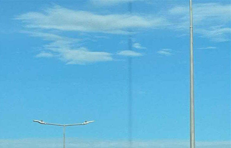 Black Vertical Line in Sky Leaves Residents and Experts Puzzled
