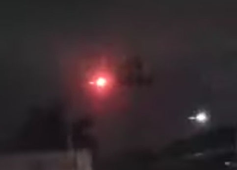 Odd Red UFO Filmed by Cancun Motorist