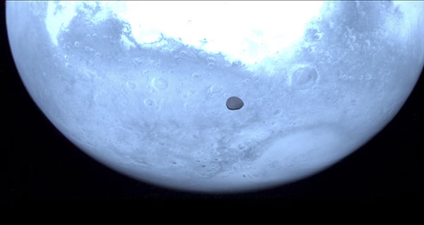Passing Probe Captures Images of Mysterious Mars Moon